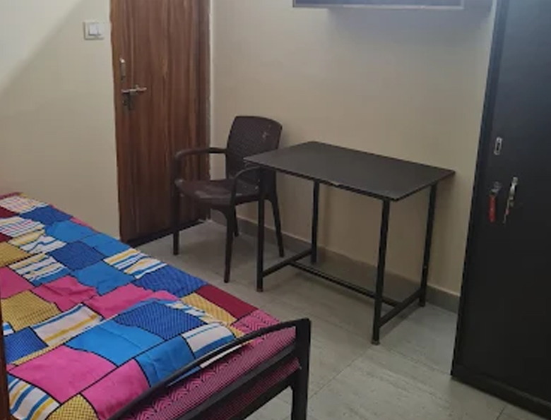 R Residency Paradise Hostel Room Interior