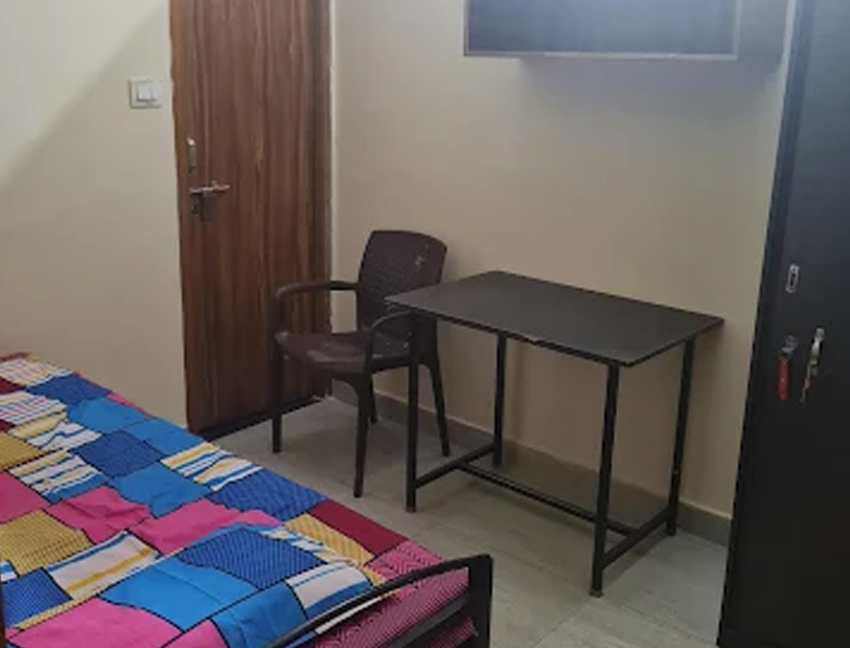 R Residency Prime Hostel Room Interior